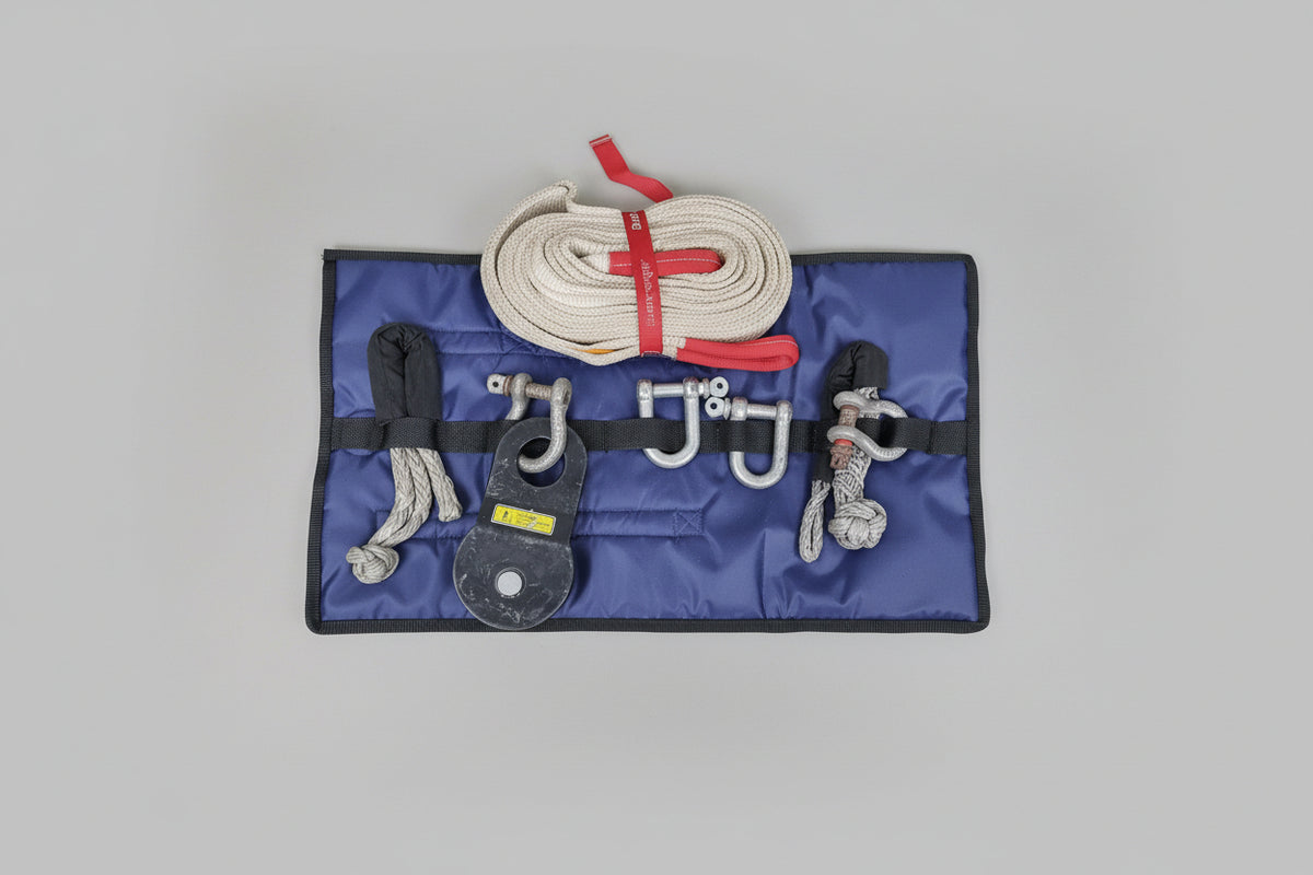 Wild Wolf Adventures recovery gear roll opened with snatch strap soft shackles hard shackles snatch block all organized neatly and secured wild wolf adventures fayoum white desert cairo egypt