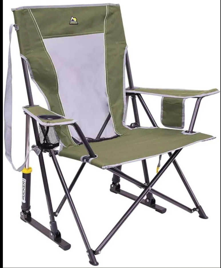 An outdoor folding camp chair with an olive green fabric body, a light gray mesh backrest insert, and a black metal frame. It features a side pocket on the armrest holding a smartphone, a cup holder, and a small side pouch.